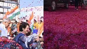 प्रियंका गांधी का भव्य स्वागत, आसमान से हुई फूलों की बारिश; सड़क पर भी बिछाए गए फूल,बीजेपी ने उठाए सवाल